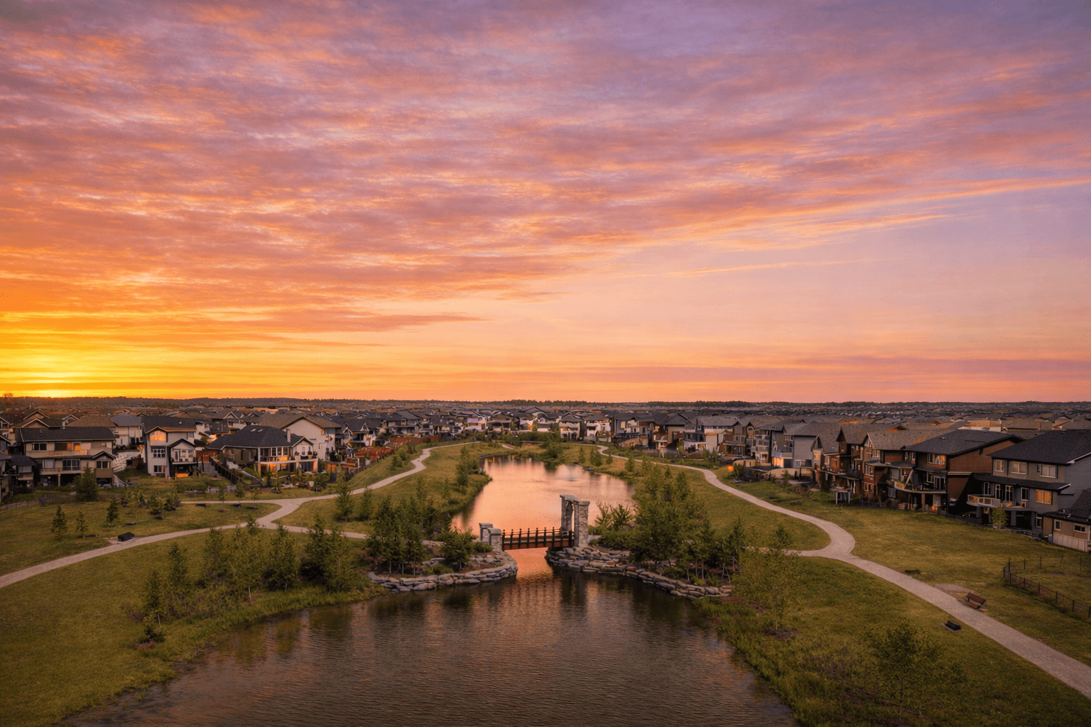 Airdrie neighbourhood lake at sunset.