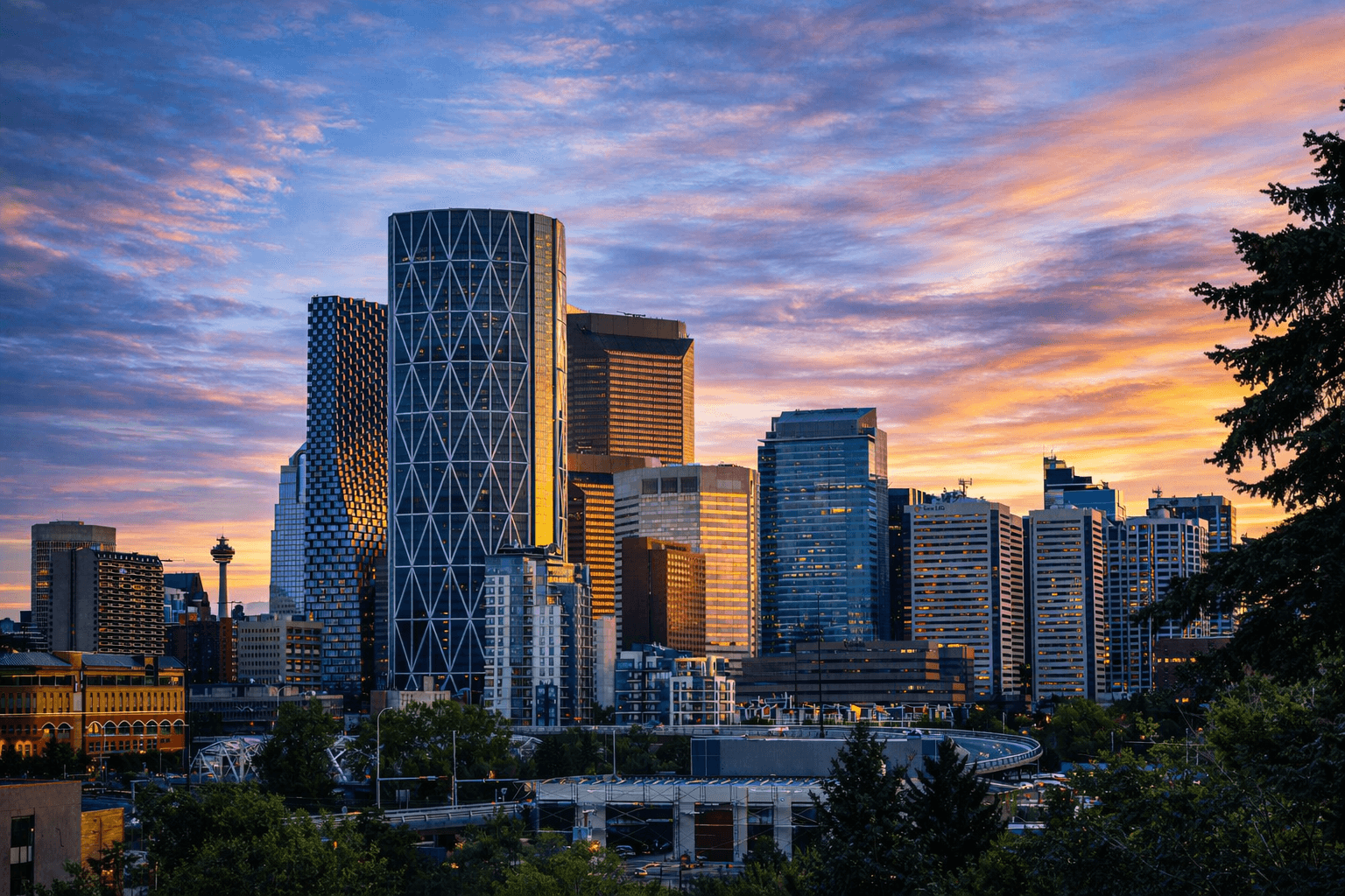 Downtown Calgary skyline at sunset.