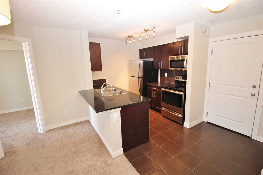 195 Kincora Glen Road NW #120 photo 2