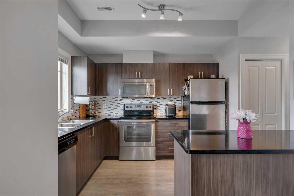 121 Copperpond Common SE #414 photo 2