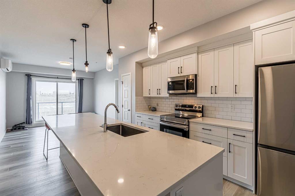 360 Harvest Hills Way NE #203 photo 3
