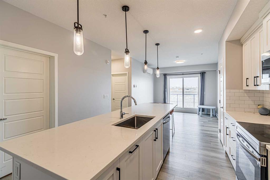 360 Harvest Hills Way NE #203 photo 4