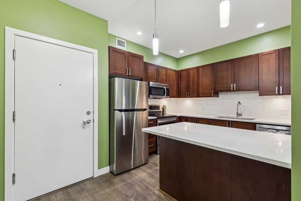 16 Auburn Bay Link SE #103 photo 3