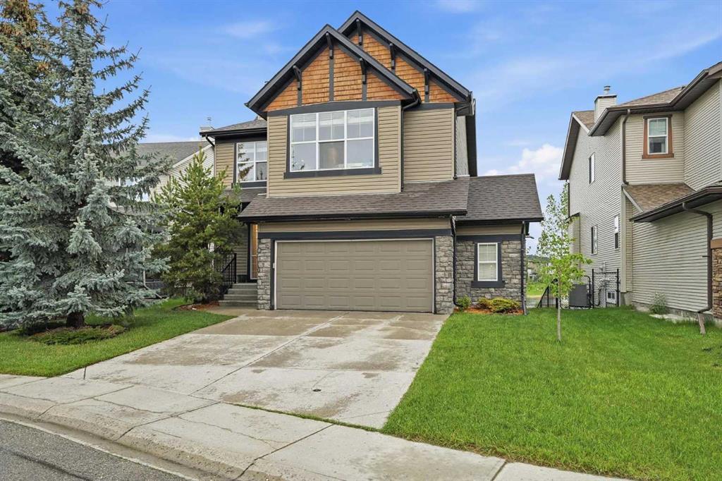 114 Cougarstone Crescent SW photo 3