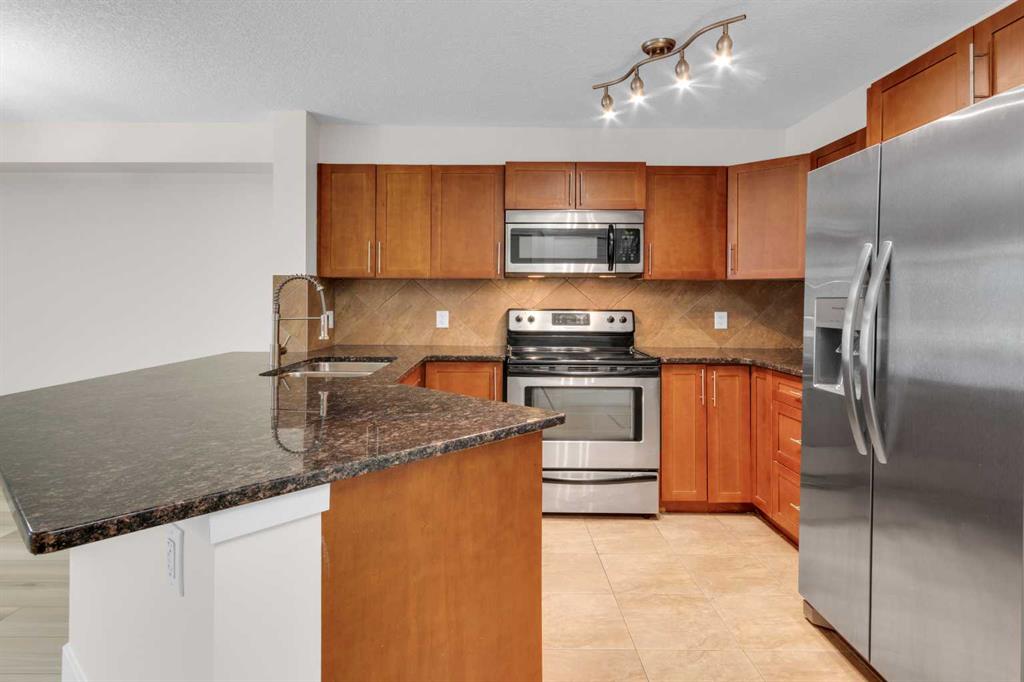 500 Rocky Vista Gardens NW #102 photo 4