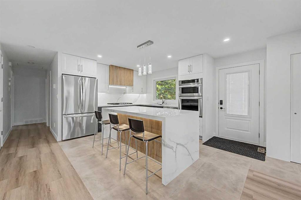 12108 Lake Waterton Way SE photo 4