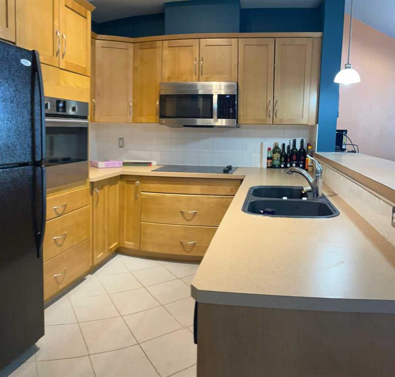 3111 34 Avenue NW #203 photo 3