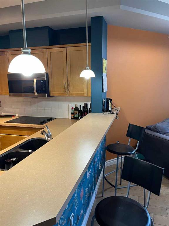 3111 34 Avenue NW #203 photo 5